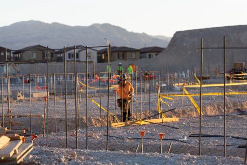 Crew laying out rebar at Skye Canyon Elementary at sunrise